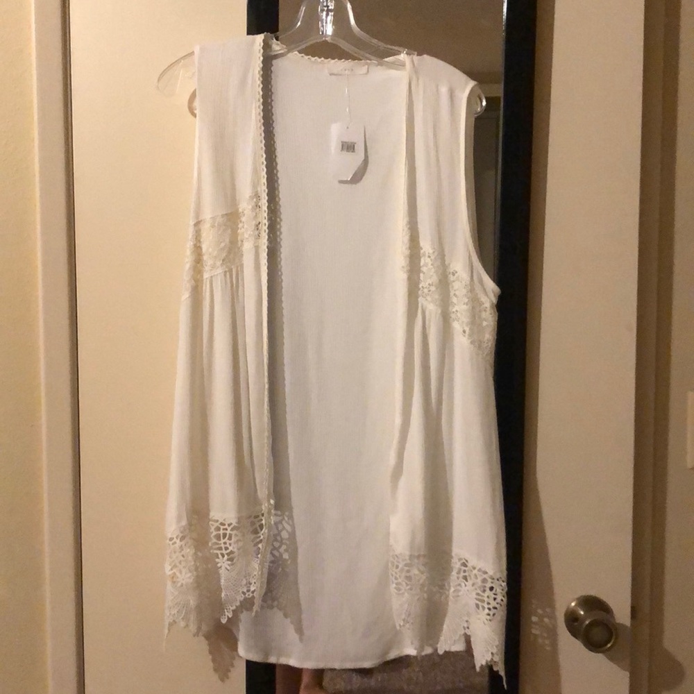 Long white flowy vest